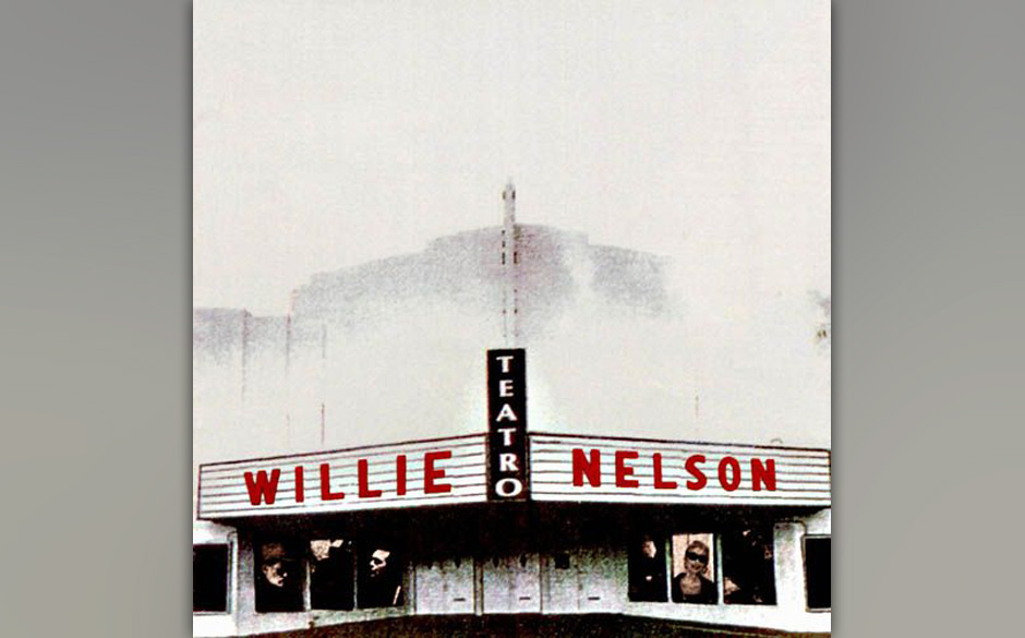 Capa do disco do cantor country Willie Nelson, intitulado "Teatro". A imagem mostra um pequeno teatro de beira de estrada nos Estados Unidos, com letreiro vermelho na fachada.